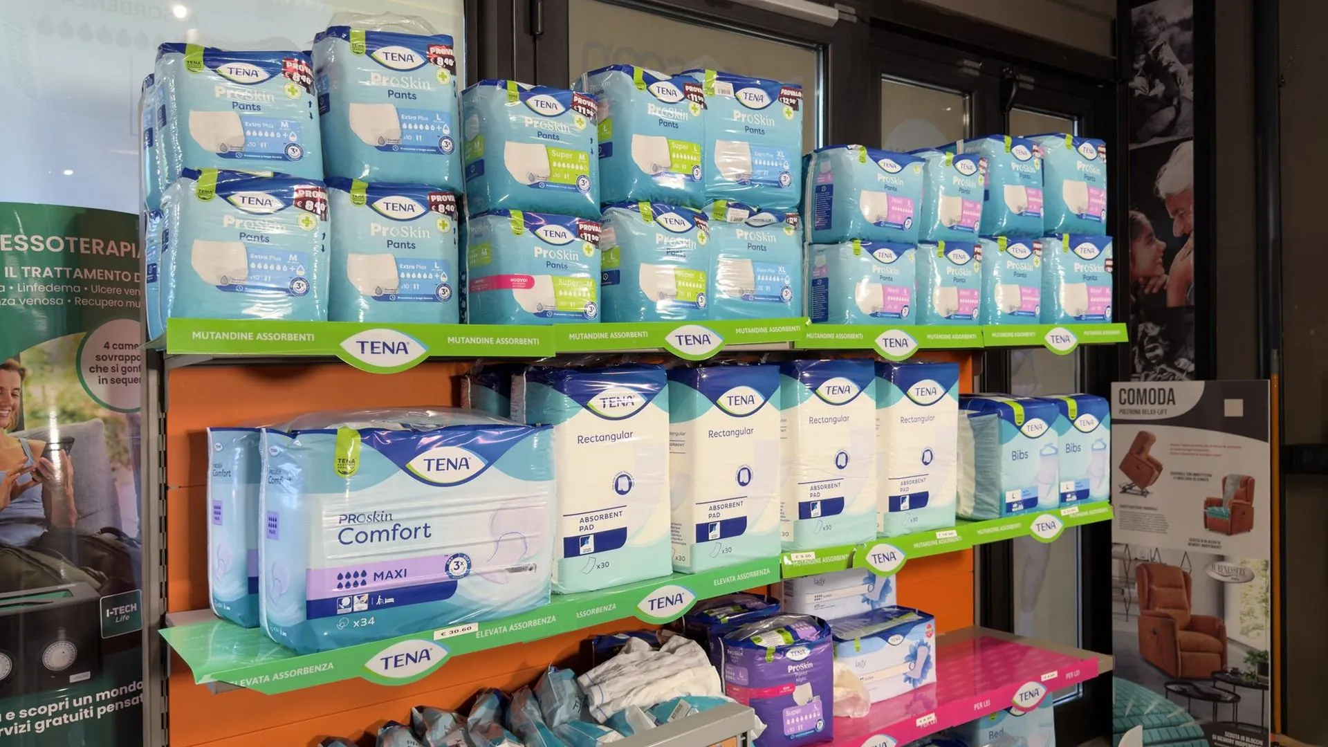 A shelf of absorbent pants and incontinence pads in the Cocoon shop on Via Crispi