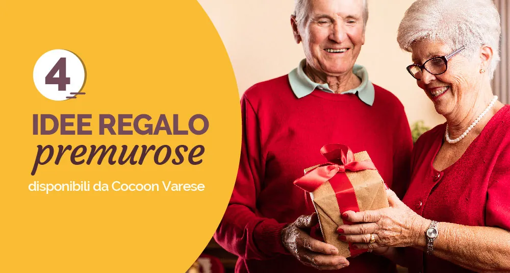 Coppia di anziani sorridenti con un regalo in mano, con la scritta «4 idee regalo premurose»