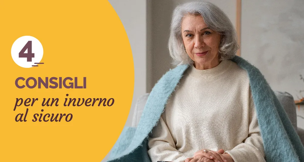 Signora anziana avvolta in una coperta, con la scritta «4 consigli per un inverno al sicuro»