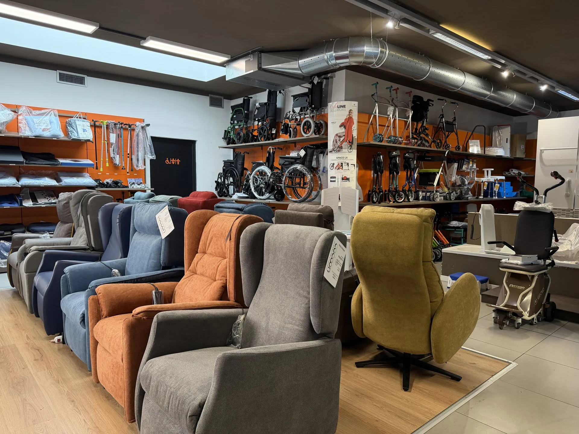 Lift chairs and mobility aids on display in the Cocoon store in Varese