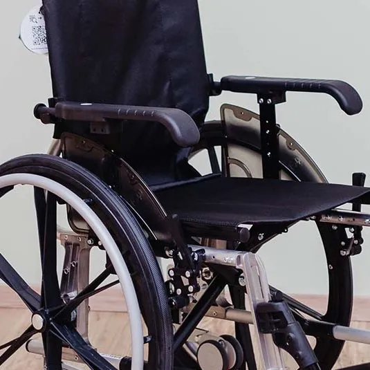 A lightweight self-propelled wheelchair with large rear wheels